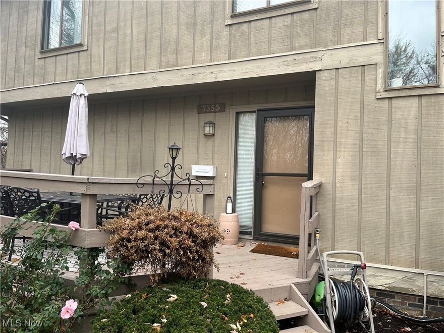 Style and Function come together in this updated Townhouse in the Chaunticlair Condo Complex. You walk into an open floor plan with the living room, dining room and kitchen all right there before you.  The kitchen is bright with sleek, white cabinets, subway tile backsplash and an island countertop seating for another place to "dine". The Master Bedroom with an ensuite full bath and walk-in closet is upstairs. Two more bedrooms and another full bath complete the second floor. An added feature is the finished, walk-out basement.  The Rec Room is a great place for entertaining or relaxing.  It is also big enough to have a work out area or set up an office. The slider doors lead to a concrete patio.  There is also a separate utility room and storage room.  The townhouse has a large front porch deck with a scenic view and a side balcony off the Dining Room. Nothing to do but move right in and  enjoy living in North Royalton with nearby parks, restaurants and shopping.