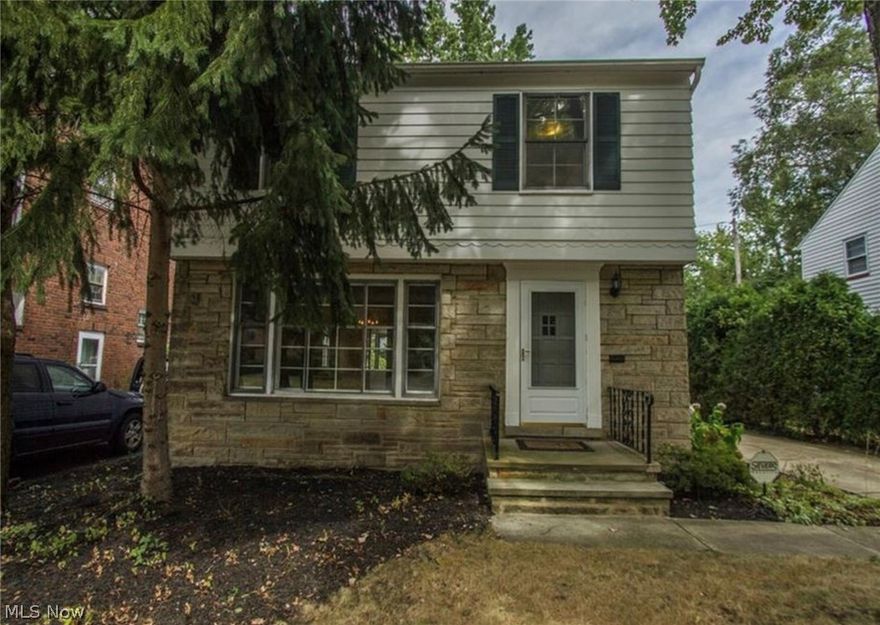 Great opportunity in Cleveland Heights! White eat-in kitchen features all white appliances, formica counters, laminate floors & double stainless steel sink. Formal Dining Room with hardwood floors & Living Room with gas fireplace & hardwood floors. Master Bedroom has 2 closets & there are 2 more additional bedrooms & a full bathroom with ceramic tile floors & shower/tub. There's a sun porch off the Dining Room on the first floor with carpet that leads to rear garden. The lower level Rec Room has a wooden entertainment counter. Washer & dryer provided. Central A/C. 1 car detached garage & concrete driveway. Partially fenced yard with hedges on both sides for privacy.