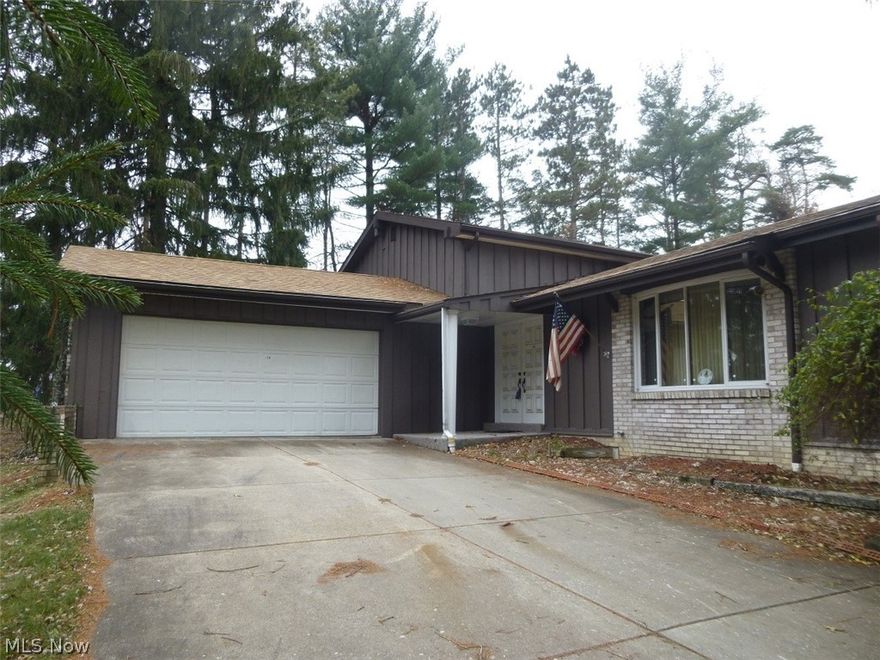 What a find. Beautiful new updated bath. Gray tile with walk in shower. Being done now is a Custom Kitchen with grey cabinets,a granite counter top, new flooring and a new window. This home is going to be gorgeous. Seller will also allow a $5,000 flooring allowance at this price.  Large multi-level home on 2 acres with a huge 40x50 metal building in back. Building has its own electric. Situated in Wintersville so close to everything. This home has 3 bedrooms and 2.5 baths. 1st floor has a Large family room with wood fireplace, office and laundry. French doors to patio. Off of the kitchen is a 17X18 Sunroom. Brand new roof on home.  Lovely gravel tree lined driveway and then cement driveway into home. Long drive goes back to the Metal building. Lovely property.  Newer Central Air. Septic has been inspected by Jefferson County Health Dept.