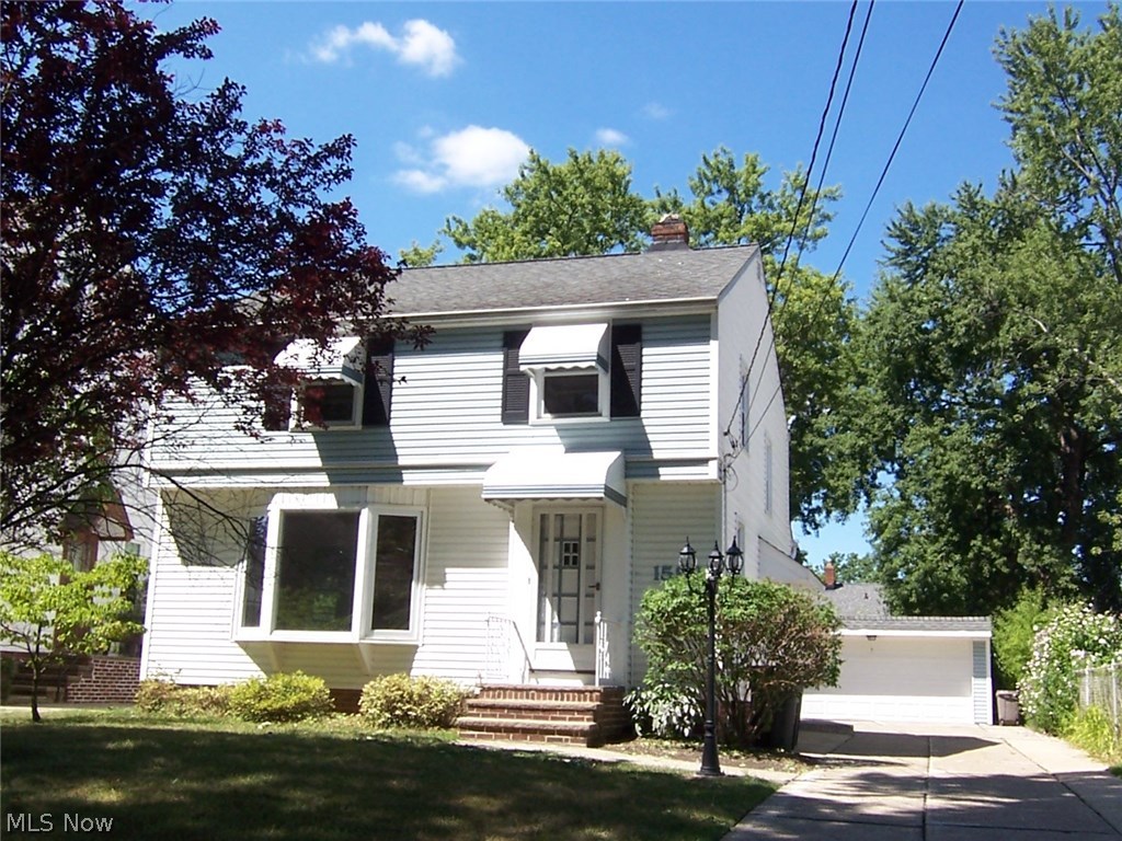 Endless possibilities!! Charming Colonial with handsome hardwood floors. Sensible eat in kitchen with abundance of cabinets.
Super Size Bedrooms featuring hardwood floors, updated windows and so much more. Newer furnace and AC.
Full size basement with Recreation Room for the family life style, large patio off dining room, two car DT garage and
partial fenced rear yard. Enjoy the wonderful location on this tree lined street near shopping, parks and so much more.