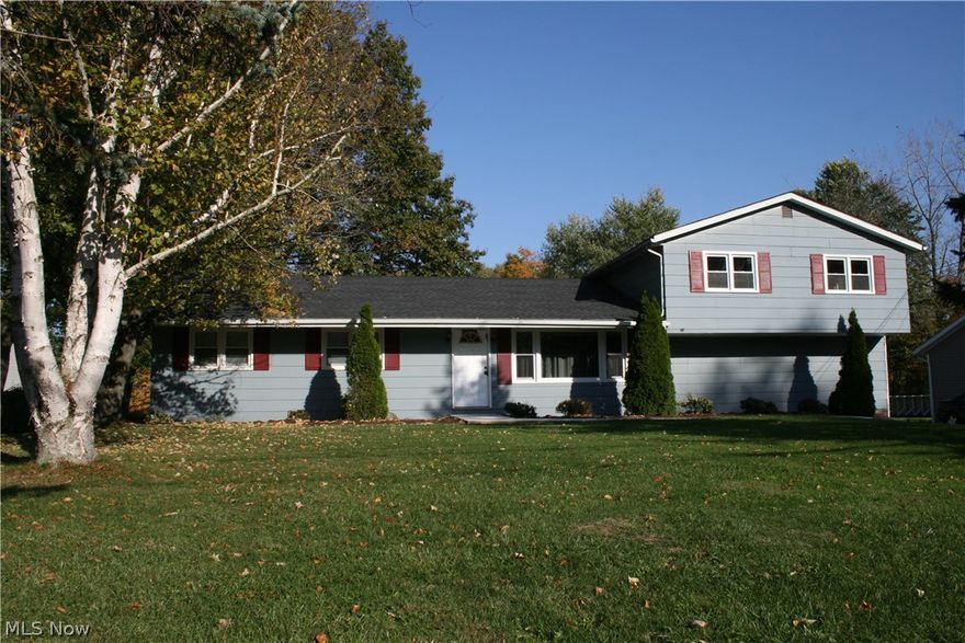 Enjoy a bit of country but close to everything! Nearly one acre, public water and sewer! One level with three bedrooms and a full bath. Full basement for laundry and extra expansion or storage.  Extra bonus is a  large room over the garage ready for your finishing touches to add extra living space. Nice sized shed and fenced dog run area. New roof in 2015.  Newer replacement windows in bonus room. Walkout basement. Living room with adjoining dining area give plenty of space to entertain. The large concrete patio is right off the dining area to enjoy the backyard privacy. Portable a/c unit included. Appliances included: fridge, stove, washer and dryer.  Oversized garage with updated electrical boxes. Quick move in possible. One Year Buyer home warranty.