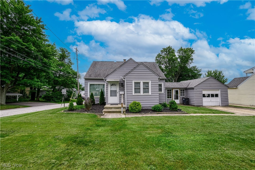 This lovely, updated Cape Cod home in Kenmore is move in ready! This delightful floor plan features a charming kitchen with stainless steel appliances, a sunny dining area, spacious living room and two bedrooms and a full bath on the first floor. The second floor has a very spacious third bedroom. Updates in the last few years include remodeled kitchen with updated cabinetry, counters, backsplash and appliances, totally updated full bath, luxury vinyl plank flooring on the first floor and carpet on the second floor, updated light fixtures and much more! New furnace (2025) and new windows and doors (2020). Attached garage, very large yard. So conveniently located near everything!