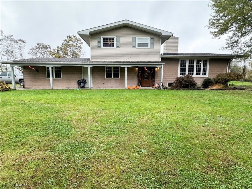 Beautiful 4 Bedroom home on just over 5 acres of land. Home features spacious living area along with an attached two car garage.  Call for your private showing.