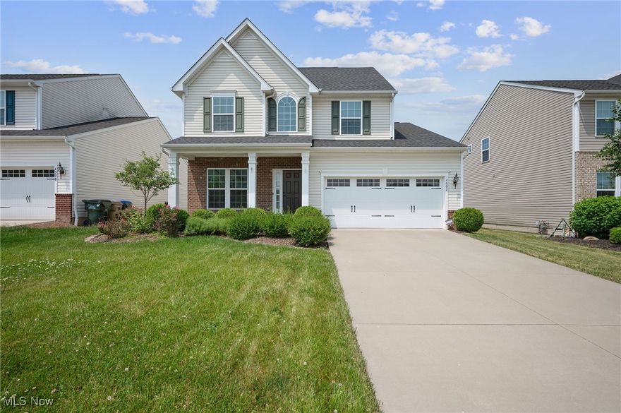 This 2018 built, 3-bedroom, 2.5-bath Peninsula, located in Hudson City School District, combines thoughtful design with modern aesthetics, featuring a welcoming foyer that opens to a flexible living or dining space, a spacious living room with a gas fireplace, a well-appointed kitchen with granite countertops, quality cabinetry, and matching stainless steel appliances, a main-level half bath, and a convenient main-level laundry room. Upstairs, the large landing offers an additional living area leading to three bedrooms including a primary suite with a private full bath and an additional full bath off the hallway. The finished basement has a nicely finished rec room, and outside, the home boasts a spacious attached garage, a stamped and stained concrete patio, a fenced in yard, and a cozy fire pit perfect for quiet evenings or lively gatherings.