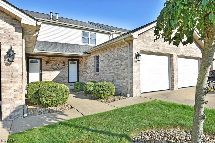 With its daring styling and bold colors, this magnificent Canfield condo will take your breath away with three floors of perfectly cultured living space! Set in a desirable location, these homes put you just seconds away from favorite local restaurants and shopping districts alike, while a stunning local metro park awaits nearby. A handsome brick exterior welcomes you home as the converted garage easily doubles as open-air living space with its fold down screen door and robust tiled flooring. Through the front door, a striking kitchen is trimmed in stone-look countertops and bright white cabinets that contrast the dark island and dining space. Ceramic flooring underfoot transitions to plush carpets as the living room opens to reveal its perfectly posh surrounding and moody wall treatments. Hidden first floor laundry offsets the dining area as a spectacular half bath completes the floor near the basement entrance. Upstairs, a pair of spacious bedrooms bring handsome appointments as they surround a lavish full bath with a raised basin sink and oversized shower. At the basement level, enjoy a finished lower family room with casual dining space and second full bath. Hidden storage is located nearby.