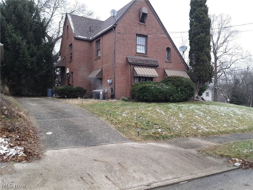 Brick tudor boasting abundance of charm and character.  Over 2000 square feet .  Hardwood floors, french doors, and two staircases to the second floor.  Two car attached garage. Close proximity to everything; interstate, schools, shopping, and downtown Canton.
Owner has taken a new job after recently purchasing this property, and is selling. "As is condition."