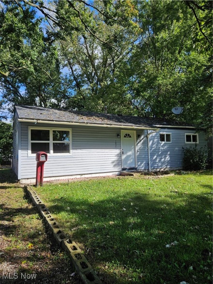 Enjoy first floor living at it's best! Recently updated 3 bedroom/1 bathroom house for rent in SW Akron. Eat-in kitchen, large L-shaped living room with sliders to the deck and nicely sized bedrooms. Many storage areas plus built-ins. New vinyl flooring throughout, new kitchen appliances, freshly painted and more. Laundry hookups on first floor. Spacious backyard with plenty of room for seasonal entertaining. Quiet street but close to parks, shopping. Dogs only - $250 non-refundable pet deposit required. No smoking. Tenants are responsible for utilities, yard work and snow removal. All adult applicants must apply online for credit, background, eviction history. $50 non-refundable application fee per adult applicant. Employment is verified. No third party applications permitted. Please contact listing agent for requirements prior to applying.