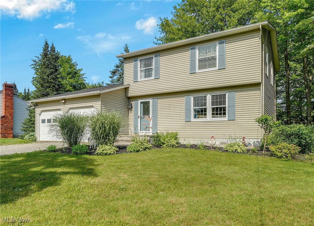 Tucked away near the end of a quiet cul-de-sac in Leroy, this welcoming home offers nearly a full acre of privacy with the added benefit of public sewers. Step inside to a formal living room with a large picture window that fills the space with natural light and offers views of the front yard. From there, flow into the dining area and the beautiful eat-in kitchen, featuring quartz countertops, stainless steel appliances, and ample space for gathering.
The kitchen opens to a comfortable family room with a rebuilt fireplace and a set of double doors—one side functioning as a walkout to the backyard—bringing in even more natural light and connecting the indoors to the serene outdoor space. A convenient half bath rounds out the main level.
Upstairs, you’ll find three nice-sized bedrooms and a full bathroom with a tandem layout - ideal for getting ready in the morning without crowding. The lower level includes a versatile recreation room ready for your personal touch, plus a large utility room with laundry area, folding station, and plenty of storage space.
Outside, the peaceful backyard offers room to roam and relax. Enjoy the private deck, large storage shed, and plenty of space for gardening, entertaining, or simply soaking in the peaceful setting. There’s also a portable generator hookup and a two-car attached garage. Most of the flooring, paint, and landscaping have been refreshed in the past three years—making this a move-in ready opportunity in a truly tranquil location.