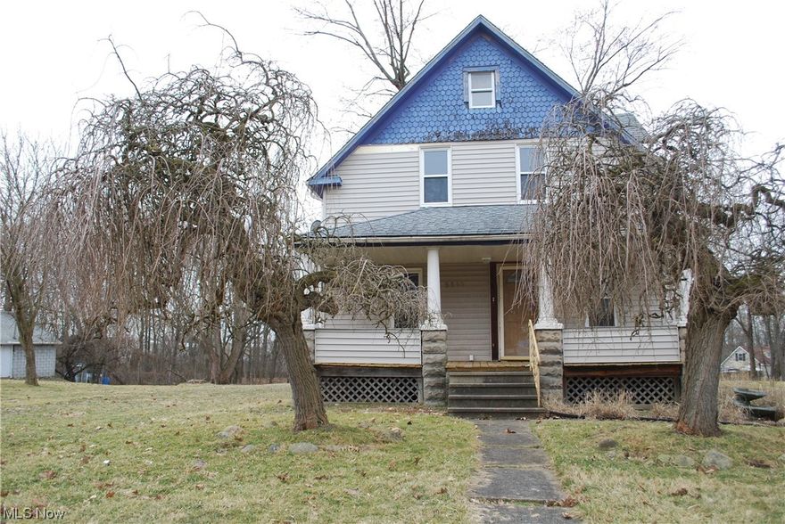 Maple Heights 3 bedroom Colonial, Features 2 Full Baths, Living room with Fireplace & Dining Room * Vinyl Windows * Porch & Deck *Glass Block Windows in Basement *
