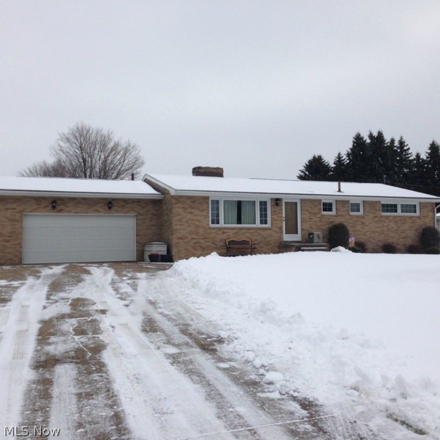 All Brick 3 Bedroom Ranch that has been well maintained. It features an updated Kitchen with newer cabinets, counter top, back splash, tile flooring and appliances. There are newer vinyl windows as well. Large living room with a stone wood burning fireplace. The master Bedroom includes a half bath for your convenience. The full basement includes an area for games and a rec room. The spacious lot includes a utility storage building. Enjoy the rear yard form the large stamped concrete patio. You will truly love this home. Call today!