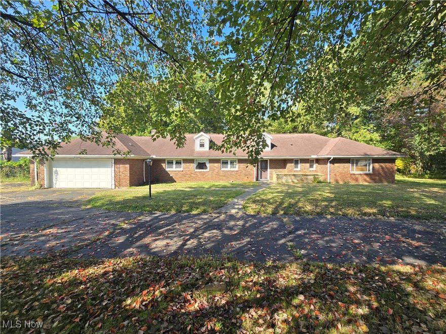Don't miss this incredible brick ranch home that offers the ideal blend of space, comfort, and style. Step inside to discover a bright and airy layout. The skylights give an abundance of natural light making the main living space bright and inviting. This home features an expansive galley kitchen, equipped with ample counter space and storage for all your culinary needs. Whether you’re preparing a family meal or hosting a gathering, this kitchen is designed for efficiency and ease. There is a large opening from the kitchen to the formal dining room with space for bar seating. The formal dining room flows seamlessly into a large living room, complete with a beautiful stone fireplace. There are three generously sized bedrooms, including a main suite with double closets. This home also features two full bathrooms, both with wide doorways and one with a walk in tub. There is also one half bathroom, located near the laundry area that is conveniently located off the kitchen. Outside you will find an expansive fenced in backyard, a true outdoor oasis with a large covered patio. There is also a storage shed in the backyard perfect for mowers and extra outdoor items. This property is situated on over an acre of land that also includes a large side yard. The attached garage not only provides ample parking space but also extra storage with a small workshop or office space. Don’t miss your chance to call this property your home! Schedule a private tour today!
