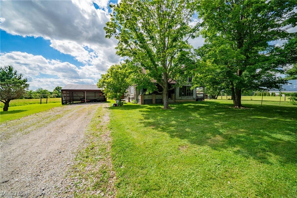 Photo of 25360 Baker Road, Wellington, OH 44090 (MLS # 5221035)