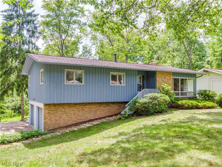 Clean and neat 3 BR, 2.5 Bath Ranch situated in a great location on the North side of Tallmadge.  Living Room w/ large windows and hardwood floors. Spacious Kitchen opens to a Dining Area and a 1st Floor Family Room with vaulted ceilings.  Double decks overlook the private backyard. Lower level walks out to a patio, and features 2 Rec Rooms (with new carpet), and a full wall brick fireplace. Half bath on lower level too! New Lennox Hi Eff Furnace and A/C (2018).  2 Car Attached Garage, and Storage shed too!  Spacious lot.  Hurry on this one!