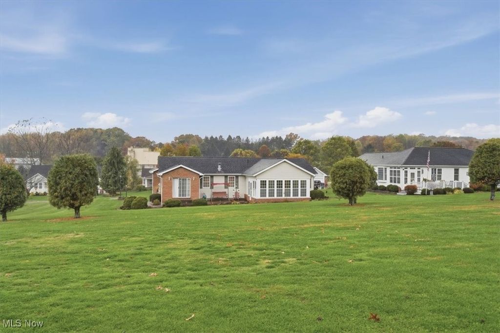 Photo of 1344 Meadowbrook Lane NE, Carrollton, OH 44615 (MLS # 5168572)