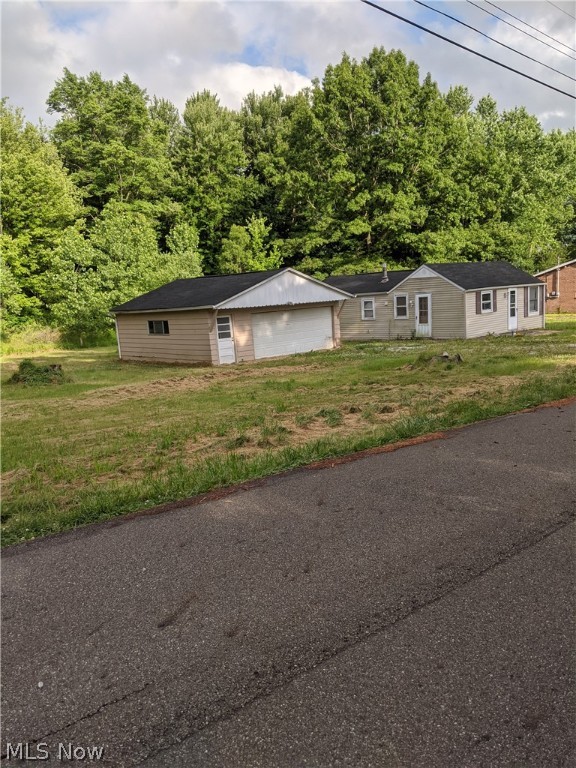 Handy-Man's Bargain! Bring Your Tools and Turn This Place Into An Adorable Ranch, Offers 3 Lots, Oversized Two Car Garage, Woods Behind.
Was 3 Bedroom, Wall Was Torn Out To Make One Bigger Bedroom, Never Completed. Needs A lot Of TLC CASH ONLY and ALLOW 3 MONTHS For An Acceptance On An Offer.