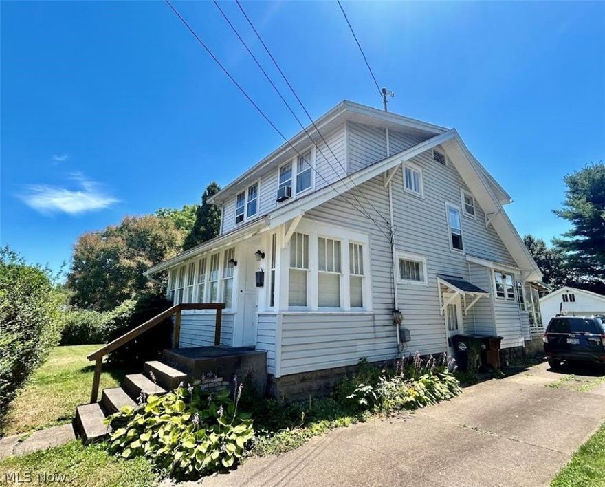 Comfortable living awaits you in this 1925 cape cod style home.  This 3 bedroom, 1 bath home offers beautiful woodwork, original wood floors throughout, decorative fireplace in spacious living room, formal separate dining room, enclosed front porch, enclosed rear sunroom, rear porch, patio, detached one car oversized garage, large private back and side yard on a level lot. The basement is unfinished and has a toilet and shower. Make your appointment today to see this nice home and make it your own!