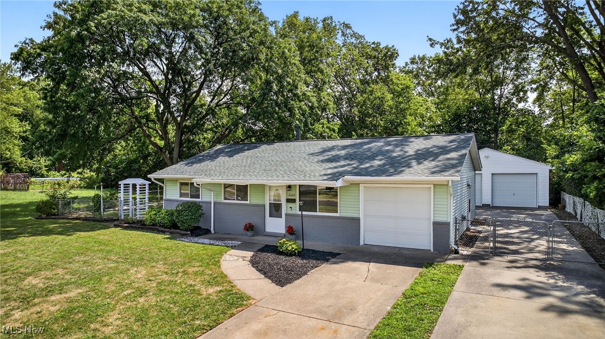 You know already, this is the home for you. How often....in Homewood....do you find a house with with 2 driveways, 2 garages, 3 garage spaces and at a very attractive price point? Not often, if at all. That is not all though! The roof on this beautiful vinyl sided ranch is only 2 years old and it features a large, fenced in backyard! On the interior, you'll find modern refinished LVP flooring, stainless steel stove and fridge (08/25 install), updated vinyl windows, and remodeled bathroom. Extra thought and care was given to modern power demands by adding USB outlets to the three bedrooms and the living room. In addition, the one car attached garage is already heated. The exterior, two car detached garage with it's own driveway is in amazing condition with its own power supply and can easily be setup for automatic openers on both doors. If storage is a concern, fear not! There is extra storage space in the attic above the two car detached garage. The concrete floor still look as if it had been poured only a few days ago! An amazing value at an amazing price, this is not a house you'll want to miss! See it quickly, this one will not last long!