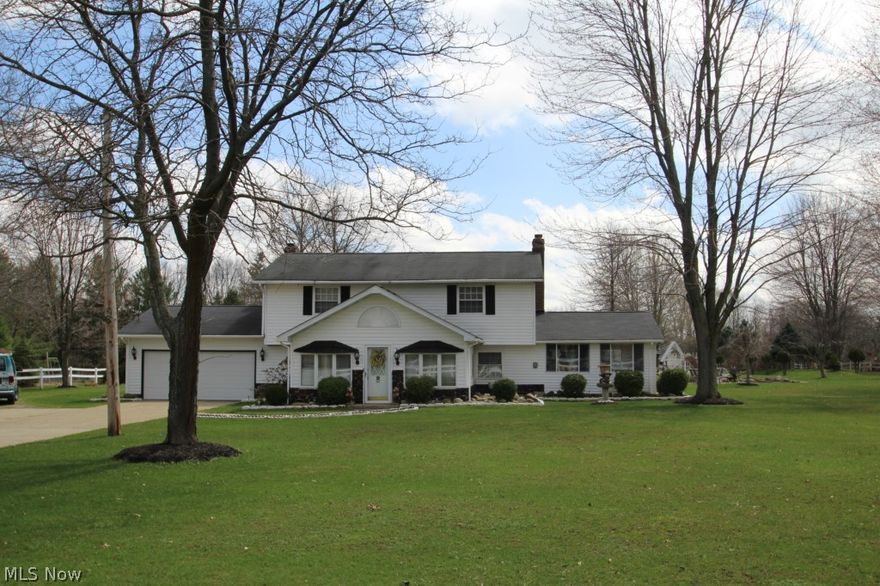 Five bedroom Colonial sitting on 5 absolutely stunning acres! Kidney shaped pond with fountains and hot tub pavilion with outdoor fireplace nestled between. Plenty of Garage and barn space. 2 brick paver patios, garden with fountain. Property has a huge shelter house for parties and entertaining and solid walls that can be attached in the winter for additional storage. 3 full baths. First floor master bedroom and master bath. Also, Laundry 1st floor off master bedroom. Huge three season room. 2 natural gas heat sources along with 2 beautiful stone gas fireplaces. This property simply has too much to mention! Call for your own private showing.