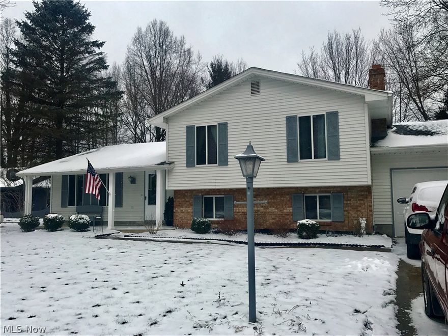 Beautifully renovated Split Level Home in Desirable Hitchcock woods subdivision.  3 Spacious bedrooms and two full baths.  New laminate wood flooring in living room, dining room, kitchen, family room/game room, stairs and halls.  Newly remodeled kitchen and baths with glazed ceramic tile flooring, marble vanities in bathrooms, and granite counters in kitchen with gorgeous back splash.  New gas fireplace in family game room.  New garage door!  New Fire Pit area!  12 X 20 Heated Workshop in backyard and shed.  3 season sun room and brick patio.  Roof done in 2015.  Furnace and central air 2010.  Don't let this one get away!