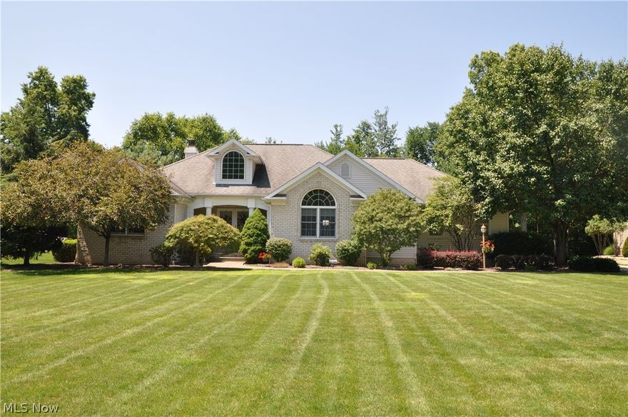 Beautiful, spacious 2350 sq. ft. home in a much sought after Howland neighborhood of custom homes! Highlights include stunning entrance w/vaulted ceiling & paladium window, skylights, great room w/fireplace, wet bar in family room, gourmet kitchen w/granite counters, 1st floor laundry, fabulous master suite, lovely private back yard w/decking & water feature. Hardwood floors in foyer, hallway, great room & eating area under the carpeting (same as dining room).