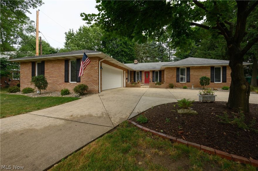 Wow! Check out this absolute GEM located in the North Canton CSD! This gorgeous 3 bedroom, 2.5 home has been beautifully remodeled from TOP to BOTTOM! Located in the heart of North Canton with convenient access to highways, restaurants, and Belden Village, the location could not be better! Make your way up to this lovely home and prepare to be amazed. Walk in the front door and you come to living room complete with a gas fireplace and picturesque windows allowing for a ton of natural light. Just off of the living room is the lovely dining space which opens perfectly into the beautifully remodeled kitchen. This kitchen is one of a kind, featuring updated countertops, beautiful tile backsplash, stainless steel appliances, and a peninsula with bar seating! You will love the spacious family room with vaulted ceiling with exposed wood beams, a great space for entertaining! Make your way down the hall and you come to the master bedroom complete with a gorgeous on-suite full bathroom. There a