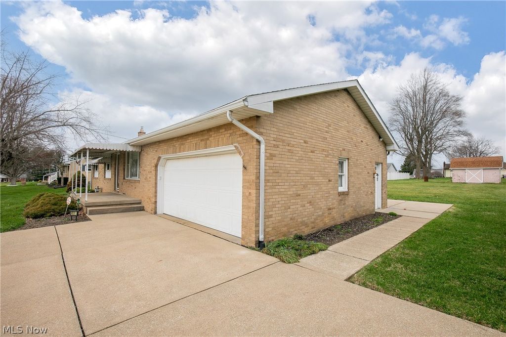 Photo of 6231 Howland Street, Louisville, OH 44641 (MLS # 5198139)