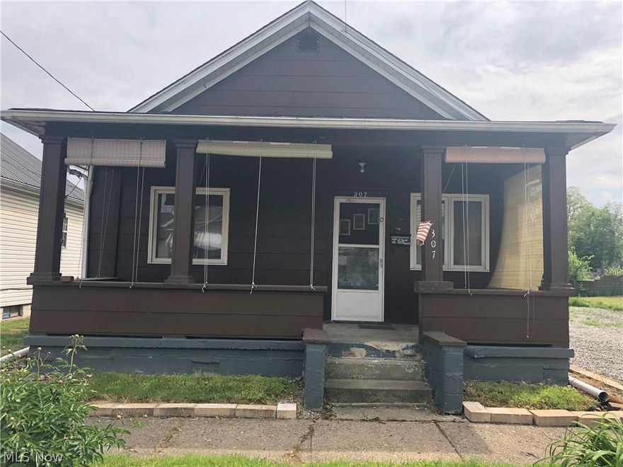 Buy this home for less than you can pay rent! 2 bedroom home on a dead in street.  Within walking distance to the grocery store and bank.  Just seconds from Rt 7.  Furniture in the house will stay.  Level flat back yard.