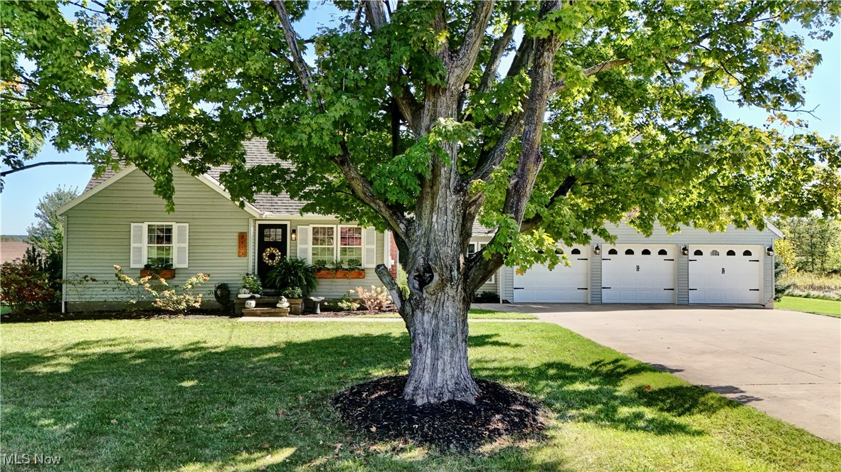 Welcome to this charming and tastefully updated Cape Cod-style home, conveniently located a short drive from downtown Wooster. Featuring 3 bedrooms and 1 bath, this residence is flooded with natural light, creating a warm and inviting atmosphere. Enter through the living room and follow the hallway to find two cozy bedrooms and a conveniently located main floor bathroom. Venture upstairs to discover a versatile finished space that can serve as a third bedroom or a home office, offering plenty of possibilities. The galley-style kitchen is a dream, equipped with modern stainless steel appliances, including a glass top stove, dishwasher, and refrigerator. Adjacent to the kitchen, the dining room boasts windows that provide lovely views of both the front and back yards, making mealtime a delightful experience. Step outside to the concrete back patio, which extends your dining area and is perfect for entertaining friends and family. The large double lot, just shy of 1 acre, offers ample room for outdoor activities and relaxation. Additionally, this adorable home includes a spacious attached 3-bay, 6 car garage with a second-floor apartment. This versatile space could be an ideal guest suite or a rental for extra income. Don't miss the opportunity to own this beautiful, Wayne County home.
