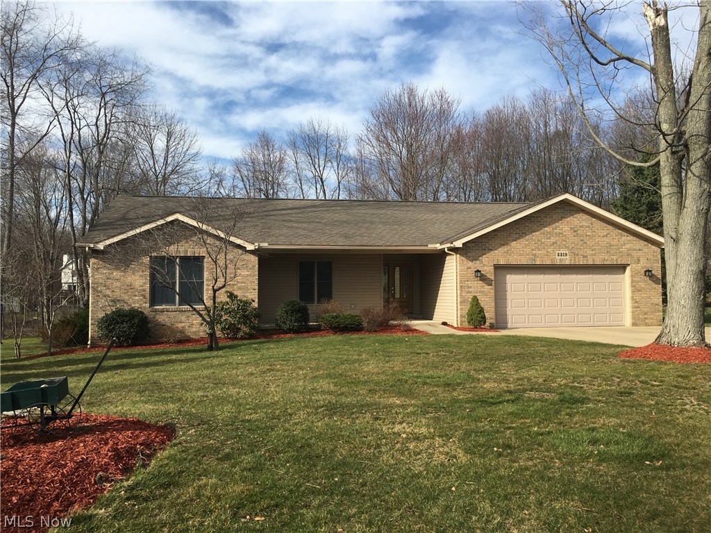The beautiful home and location you've been waiting for simply has it all. Built for a loved one, improved by a builder, enjoyable to own. You'll appreciate the open floor plan (totally handicap, motorized wheelchair accessible) 1920 sq ft on main floor with inviting sunroom comfortably viewing all seasons. Real hardwood floors in foyer, dining, kitchen, and laundry rooms. First-floor master 15x15 with great organized closet and brand new double sink and vanity. Nice-to-know features include ventless gas-start fireplace, 6 panel doors, vaulted ceiling, handy BBQ deck, 150 amp home electric panel, attic fan, central air, clothes dry (gas or electric), neutral décor, professionally landscaped. More than ample kitchen cupboards and counter space with new stainless steel appliances. More brand new items include 22 KW Generac backup system makes this home worry free, steel supports under sunroom, 3/4 hp 'quiet' motorized garage door opener, insulation, 3/4 hp well pump/large bladder