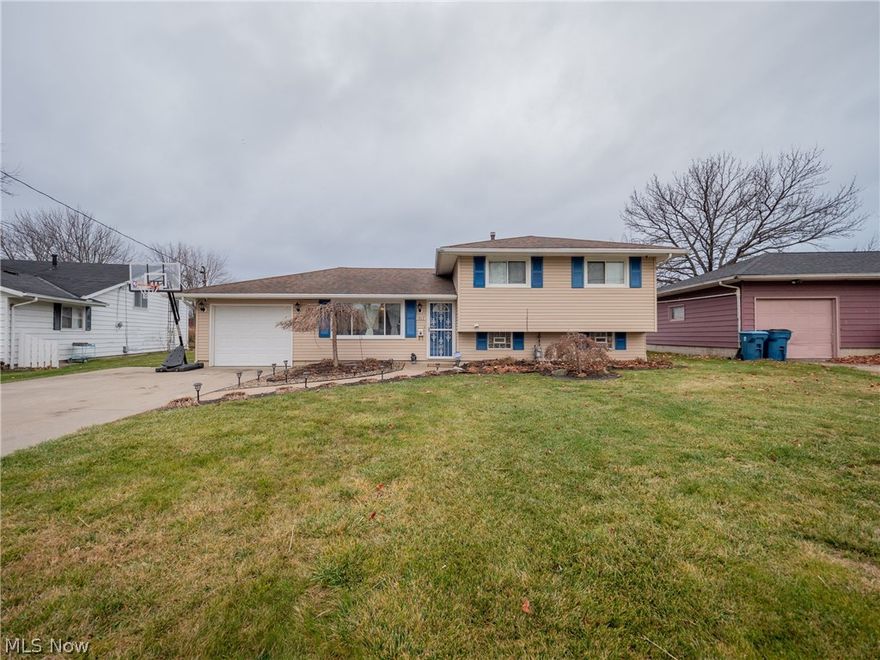 Captivating split level home perfectly priced, This home features 3 spacious bedrooms with original wood floors, 2 full recently remodeled bathrooms.  Large full fenced backyard with a beautiful gazebo.  Garage has been updated and remodeled with epoxy floors, new drop ceiling and storage area above it, it also comes with a heater to use in the winter. The must see finished basement with ceramic and epoxy floors, family room and full bath. Laundry room is located also in the lower level. The modern look presented in the living room is very inviting with an electric fireplace and mantel.  Well lit kitchen and dining room with newer vinyl plank. The three bedrooms have the original wood floors which have been treated and well maintained. Near hospital, grocery stores, gas stations, shopping and dining.  Close distance to downtown Lorain and Black River Landing. Easy access to highways.