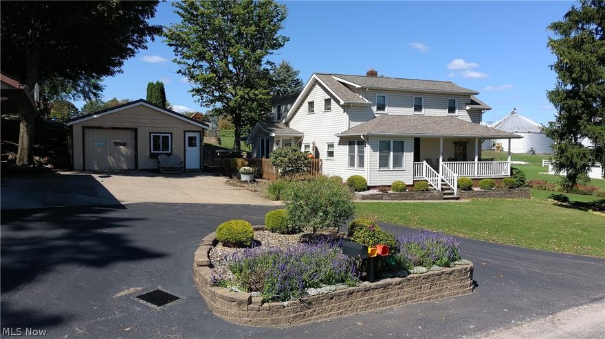 Onsite Auction: Wednesday, Oct 27th, 5:00 PM. Open for Inspection: Monday, Oct. 11th from 4:00 to 6:00 PM & Saturday, Oct. 16th from 1:00 to 2:00 PM.
Here’s a unique opportunity to buy a 5/bedroom home with a shop/barn, and other outbuildings within walking distance of Mt Eaton. The home underwent a complete remodel and addition in the 90’s and has been well cared for. The main floor features an open floor plan with large living room, dining area, and spacious kitchen with hardwood cabinets. One bedroom and one bathroom round out the first floor. Upstairs you will find four additional bedrooms and another full bathroom. The basement hosts a summer kitchen and washroom along with storage space. Walk out the back door and enjoy the new 18’ x 32’ concrete patio, picturesque landscaping, retaining walls and mature trees. Drive up the asphalt driveway to the newer shop/barn, built in 2001, that features stone front and covered porch. The 30’ x 38’ shop section has a garage door, is heated