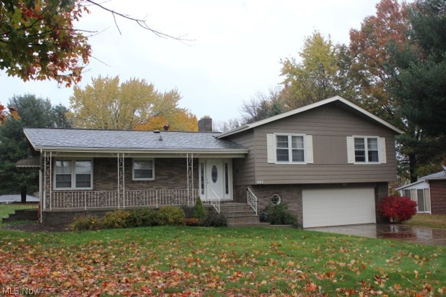 Just move into this wonderfully updated 3 bedroom/2.5 bath split level with 2394SF* Starting with the newer beveled glass front door & side entry lights* New engineered wood floor throughout living room & dining room* Updated spacious oak eat in kitchen with laminate floor, slate grey GE appliances (refrig, range, microwave & dishwasher)* Breakfast room with access to side yard* Wood floors throughout bedrooms & hall* Master with 3 closets, fan & private bath* 2 additional bedrooms with fans & guest bath with updates & double vanity* Spacious laundry/utility room with half bath & access to covered patio with built in gas grill* Lower level rec room with gas log fireplace (pool table negotiable)* Oversized heated 2 car garage with extra storage area* Covered front porch* Level .6 acre lot* Pressure tank (2015)* Newer light fixtures, ceiling fans, hardware & faucets* Interior painted -walls & ceiling (no wallpaper)* Laundry chute* Waterproofing*