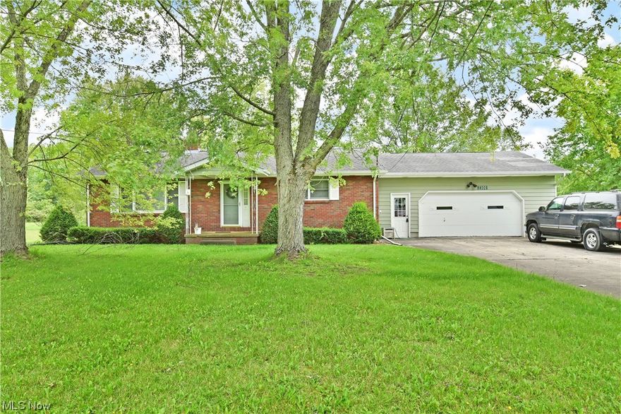 Unlock the full potential as you let your creativity run free with this promising Southington ranch! Whether you plan for a quick cleanup or a full renovation with updates, this home offers an impressive foundation with its sprawling three-bedroom layout and a full basement. Located on a prominent, semi-rural corner lot, the residence brings scenic views as tall trees provide a touch of both shade and privacy alike. A concrete drive leads up to a two-car attached garage while a covered front patio provides the formal entryway. Inside, a spacious carpeted living room enjoys large picture windows and a substantial, brick mantle with inset fireplace. Nearby, the master bedroom suite wraps around to reveal a full private bath and ample closet space. The main hall opens to an expansive combined kitchen and dining areas as the sliding glass doors provide plenty of natural light. Basement access is found nearby where laundry is located along with plenty of storage opportunities. A pair of welcoming bedrooms complete the floor as they flank a second full bath at mid hall. Call today to be first through the door and start your process!
