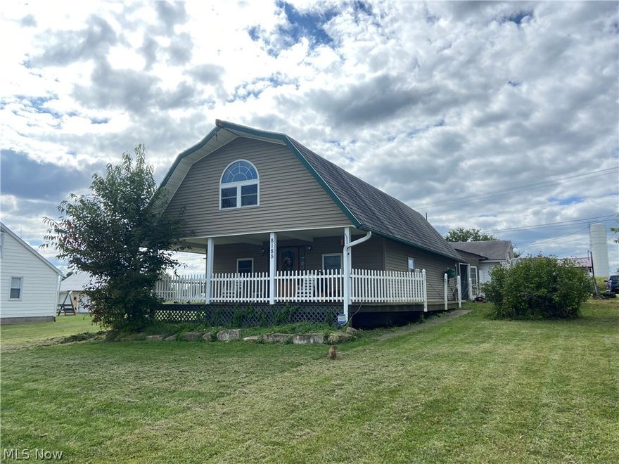 Open floorplan with 2 story livingroom, custom designed Amish built cabinets. The open loft area has 2 bedrooms and a half bath. The 1st floor master suite has an amazing closet. This home features 1st floor full bath and laundry.  The 40x24 garage has a half bath, a finished man cave and a workshop area! The front porch is large and inviting and the rear porch is private and partially enclosed. This is a must see!