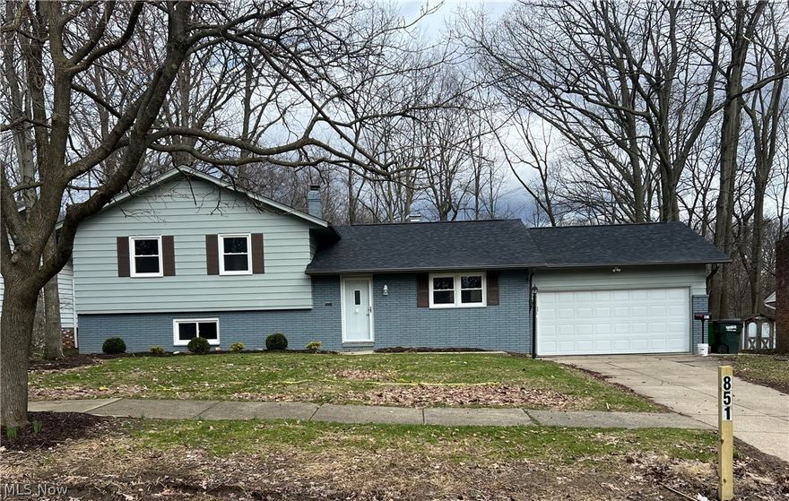 Fully renovated split level home in Bedford with wood burning fireplace. Home has a new roof, new windows, new engineered hardwood flooring from Sheoga on the first and lower level. New high efficiency furnace. New exterior and interior doors. New insulated garage door. New kitchen with granite countertops, new cabinets. New bathrooms, with the main bathroom featuring a whirlpool bathtub. The house has recessed lighting throughout, all have the nightlight feature. New kitchen appliances (oven, dishwasher, microwave, refrigerator, new disposal, new dishwasher. Kitchen also has an above the range hood exhaust fan. Both bathrooms are wired for and feature bidets seats. The garage has a new side mounted garage door opener and features recessed lighting. Home also features ceiling fans in each of the bedrooms as well as in the kitchen and dining area. Beautiful views at the rear of the house. PLEASE USE SUPPLIED FOOTIES OR TAKE SHOES OFF. PLEASE NO CHILDREN ALLOWED DURING SHOWING! NO PETS PLEASE.