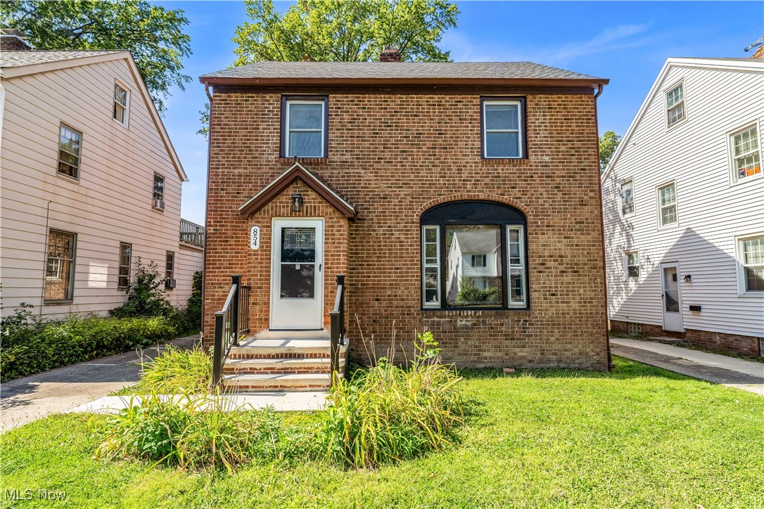 Welcome to this stunning brick Colonial, offering exceptional curb appeal and a perfect blend of classic charm and modern functionality! Step inside to the inviting living room, where luxury vinyl plank flooring, a cozy fireplace with mantel, built-in shelving, and multiple windows create a bright, warm space ideal for family gatherings! Enter the formal dining room, complete with a beautiful light fixture, built-in shelving for display and storage, and surrounding windows that fill the space with natural light—perfect for entertaining friends and family! The well-appointed kitchen features stainless-steel appliances, including a fridge, stove, and dishwasher, while a convenient half bath on the main level adds practical functionality! Upstairs, four spacious bedrooms share a full bathroom, offering comfort and versatility for family living! The finished third-floor room provides additional living space that can easily serve as a fifth bedroom, home office, or playroom! The full basement features a built-in bar and separate laundry area, perfect for entertaining or extra living space! Outside, enjoy a detached two-car garage and a private lot, while easy access to nearby highways makes commuting a breeze! This home effortlessly combines timeless elegance, functional living spaces, and modern updates, making it ideal for families or buyers seeking room to grow! Don’t miss your chance to make this exceptional Colonial your new home—schedule your showing today!