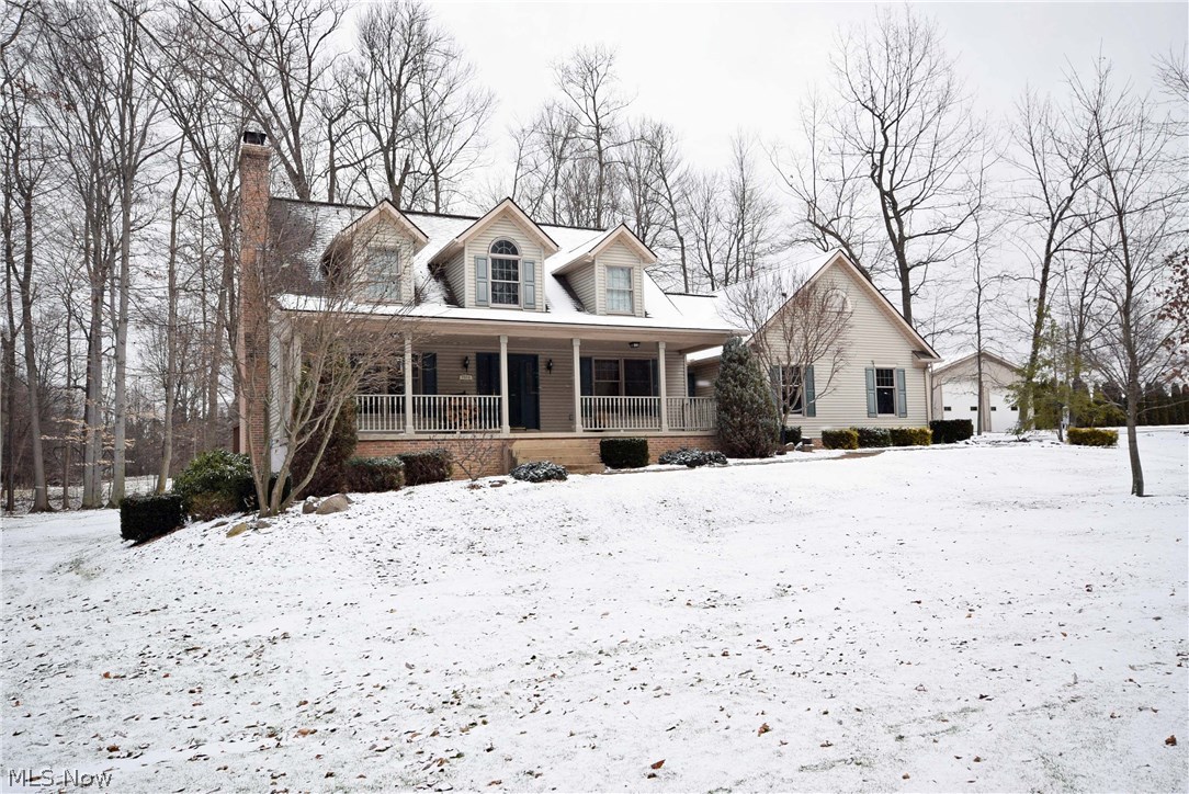 Immaculate Custom Built home on 6 acres, Smithville Schools. You won't find a more peaceful park-like setting! This home is 3BD, 2.5BA, 3 car attached garage and a 30'x50' detached 4 car garage. 1st floor Master Suite with walk-in closet, bathroom with dual sinks, jacuzzi tub & separate shower. First floor also includes large living room with brick fireplace, kitchen, dining area, laundry room w/ sink & half bath. Spacious oak kitchen comes fully applianced, with large island and ceramic tile floors. Tile floors continue down the hallway leading from the kitchen to the half bath, laundry room and the garage. The bedrooms upstairs are spacious with a dormer in each. Paved driveway, newer pressure tank and R.O. system. Property includes 200 service in the house and detached building. This house is a great value on a rare property! Call to schedule your showing today!