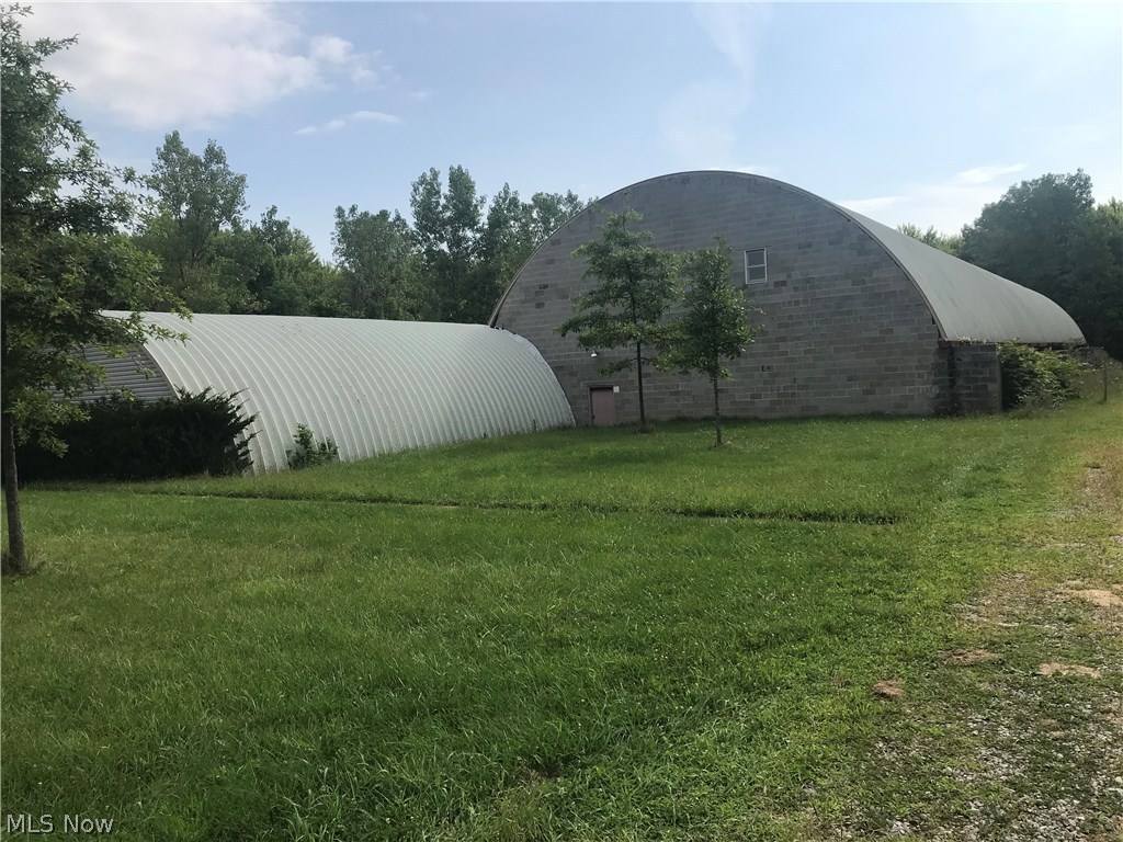 200 x 50 Building with electric, dock going into building.. so many possibilities!! Attached is a 30 x 46 building perfect for offices - has 2 bathrooms. Must See!!