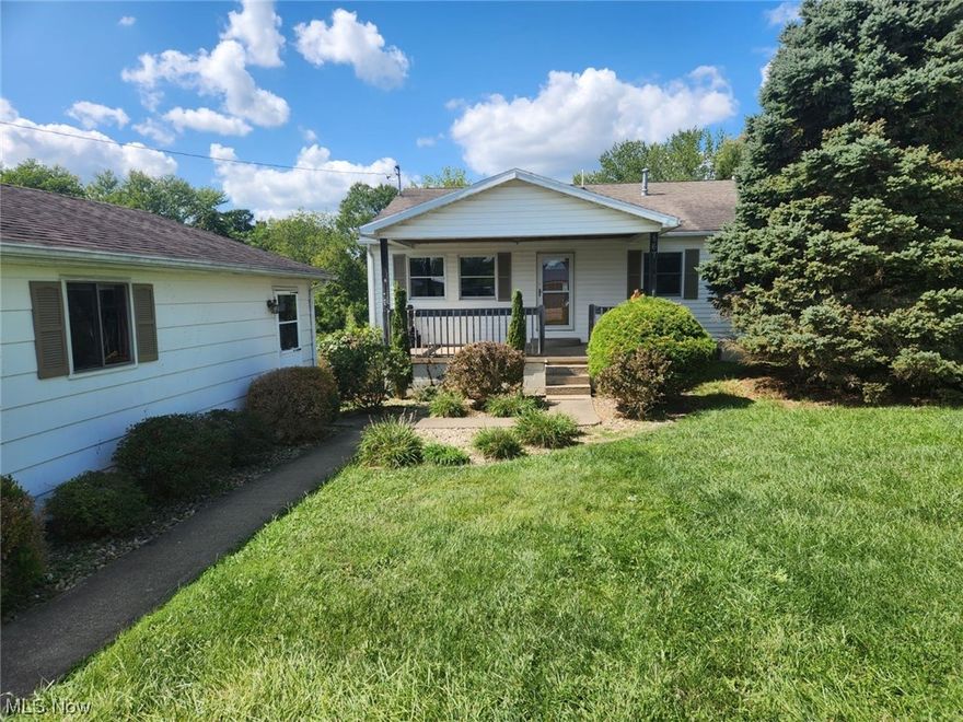 2.6 acre ranch just outside of town. 4 bedrooms. The largest bedroom could easily be made into a rec/family room. Two garages, one attached, one detached. Mostly flat land. Desirable location just off of Blennerhassett Heights Rd. Large deck on back overlooking nice view of the land!