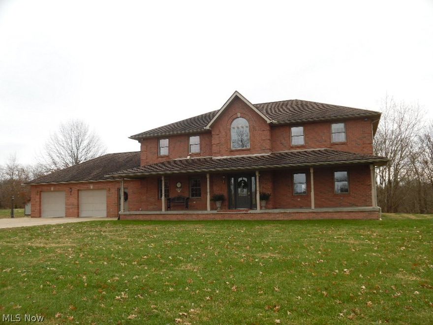I COULD WRITE A BOOK!!! This custom quality built home is just outstanding!!! No details were left out from the poured foundation, all brick, dimensional roof, concrete front porch and sidewalks with lighting, hardwood flooring, and the list goes on!  Generous rooms throughout, HUGE eat-in kitchen with bay window and plenty of storage, counterspace and windows to take in the views of the rolling acreage!! (new survey, description etc. being completed). Wonderful flow of the first floor lends itself to comfortable living for all!  BUT WATI! THERE'S MORE!! Not only do you get 9 beautiful rolling, scenic acres, there is an amazing 36 x 115' Pole building with concrete floor, heat, half bath, several overhead doors, and all you need to store your RV!!! There is a shop area, garage area, rv storage area with loft for even more storage.  You and your friends can store all of your toys right here!!  Don't miss this BEAUTIFUL COUNTRY ESTATE!