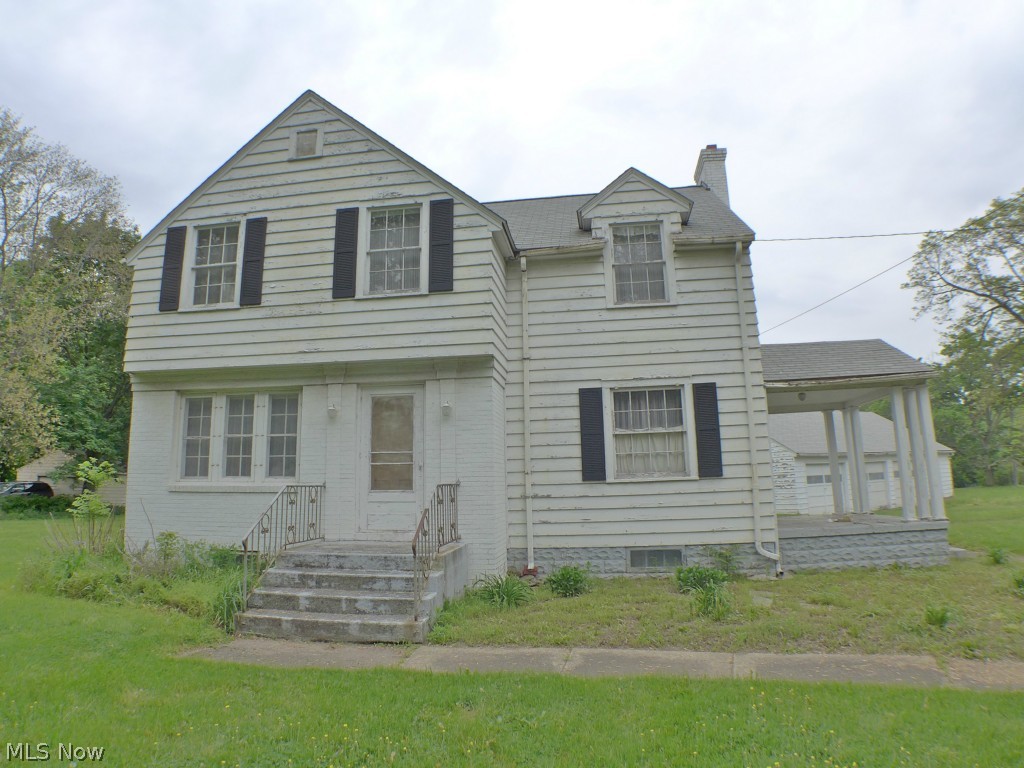 Nearly one acre of commercial property on Mahoning Ave just 4/10's on a mile South of the Rt 82 bypass, Frontage on 2 roads (Corner of Mahoning and Rosedale) 1845 Sqft 2 story home built in 1940 is structurally sound , but is is need of renovations, also a 42x26 3 car garage is on the property.