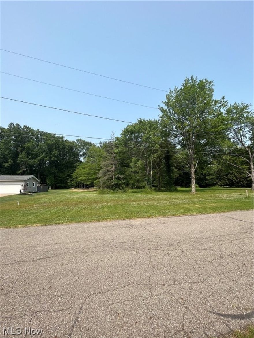 Approximately 1.8+ acres in Vienna Township. City water, Sanitary Sewer, gas, & electric available. Close to Brookfield, Sharon/Hermitage, Warren, & Youngstown. Close to major highways .  Cleared and wooded areas.