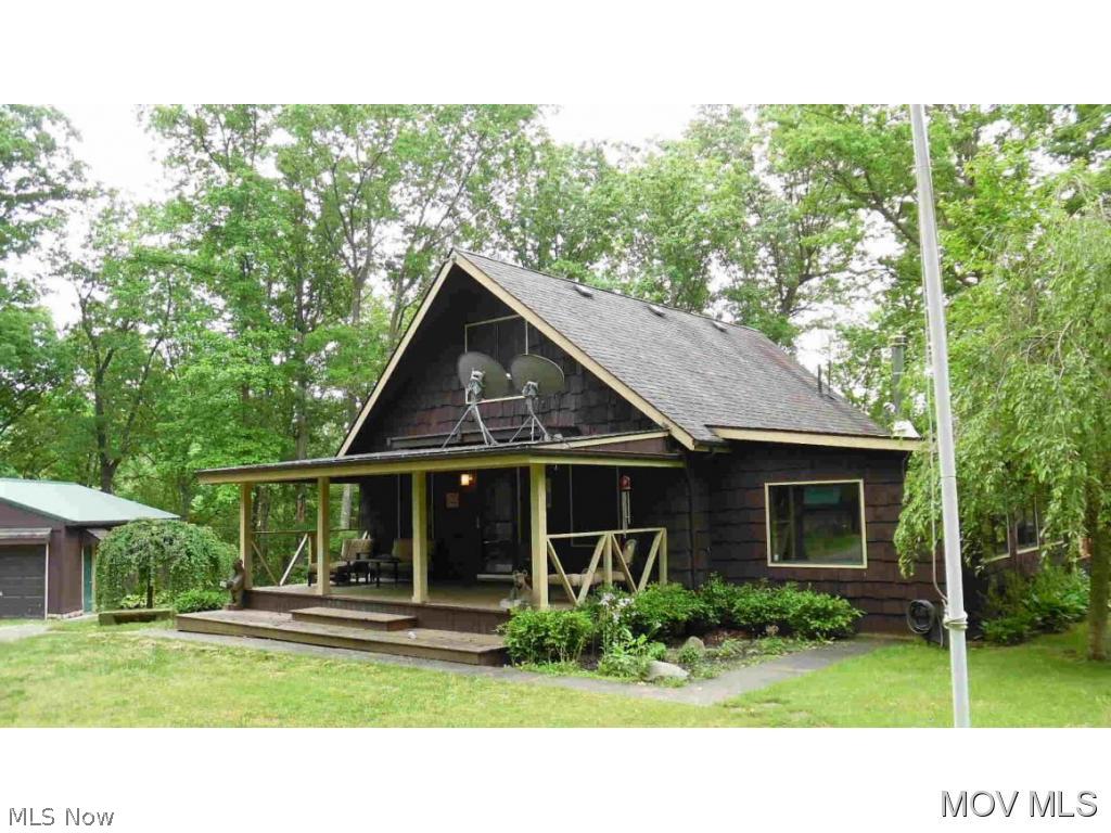 Peaceful country home situated on 8.5 acres close to Marietta and Belpre. Home has been updated with new gourmet kitchen. Full height cherry cabinets, slate tile backsplash & granite countertops. Family room has window walls. New private master suite on second floor. New flooring, crown moldings, baseboards and finished basement. 3 car detached garage with ½ bath. Parking pad for boat or RV. 7, 16 x16 barn, fenced pasture, 10 x 10 cabin, 7 x 32 shed, 30 x 30 barn. Stocked pond. If you enjoy peace and quiet don't miss this beautiful country property! Elem: Barlow-Vincent Elementary Scho Elem/Bus: Y JrHigh: Warren Middle JrHigh/Bus: Y High: Warren High School High/Bus: Y Fire: VOL Police: SHF ;SQFT=Fin L1:1070, Fin L2:350, Fin Bsmt:416, Fin Above:1420, Fin Total:1836, Unfin Bsmt:354, Unfin Above:354;GAR= 3 Car Det, Opener(s);PRKG= Off Street, Parking Pad, RV Parking