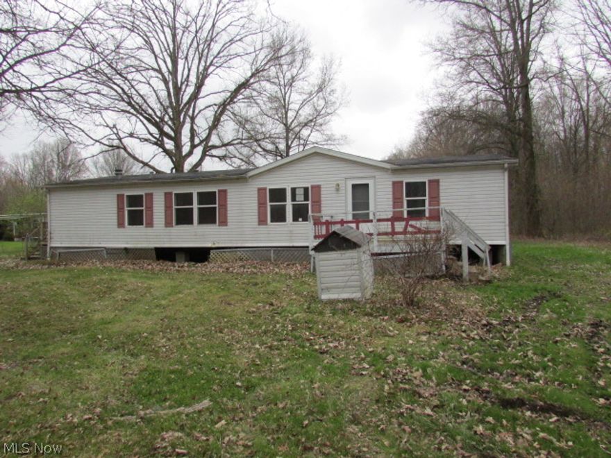 Enjoy quiet setting on your private wooded lot.  The open floor plan creates a good flow in the home.  Property sold AS IS. Equal Housing Opportunity. FHA uninsurable.