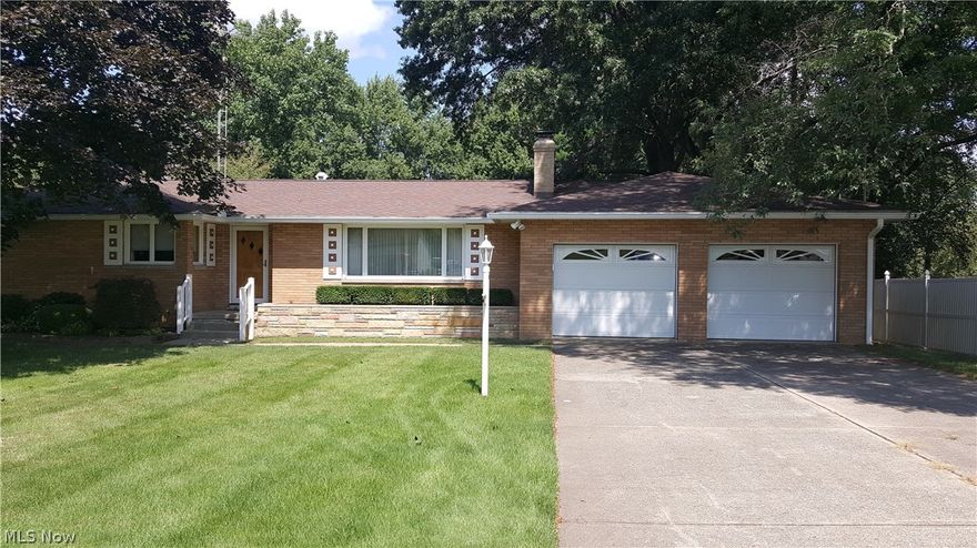 $149,900.  3 bedroom brick home with a sunroom.  Full basement with finished family room.  New carpet in living room, dining room and hallway. Fireplace in the living room.  A water purifying system located in the basement for the drinking water for the kitchen faucet.  Home includes rangetop, oven and refrigerator.   Country living with city shopping not far away.  Convenient to Mount Union College.  Many times students live off campus.  This would be an option for the investor parent.  If you are wanting to downsize from the two story home and live an easier lifestyle, you may have found your next move.
Take some time to look at this home.   Make a plan to contact your favorite Realtor and set up an appointment to see this ranch home.