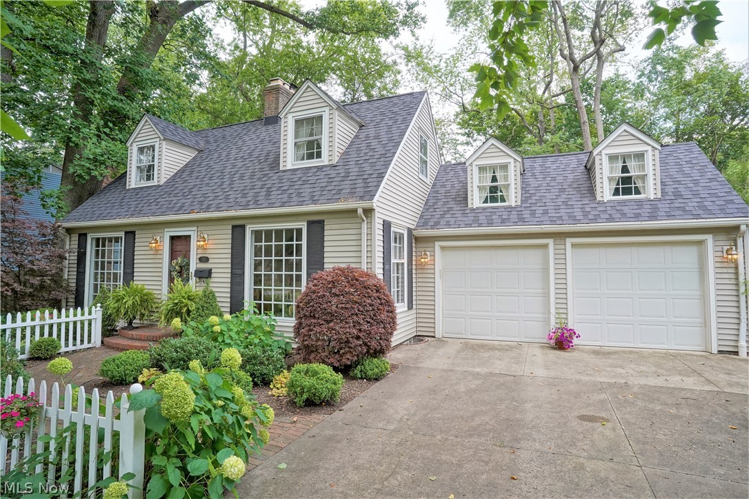 This home is an absolute MUST-SEE HOME!!! This owner has lovingly cared for the quaint cape cod style home & will make you feel at home upon entering the front door. Walking to the front door on the brick paver sidewalk lined w/a white picket fence is so inviting. Hardwood flooring graces the 1st floor. The spacious living room offers a lovely focal point w/the woodburning fireplace. Step down into the unbelievable family room w/a wood lined vaulted ceiling boasting recessed lighting & windows that adorn the back wall offering a view of the private patio & backyard. The kitchen has a bayed dinette area that overlooks the manicured front lawn, white cabinetry, dishwasher, range, refrigerator & microwave. Heading to the back of the house is a full bath & a bonus room w/2 closets that could be used as a formal dining room, office or bedroom. How great is it that you can make that room whatever you would want? For added convenience on the 1st floor there is a generous sized mud room that w