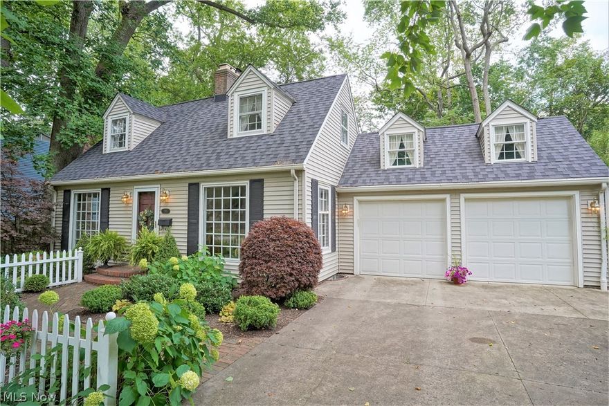 This home is an absolute MUST-SEE HOME!!! This owner has lovingly cared for the quaint cape cod style home & will make you feel at home upon entering the front door. Walking to the front door on the brick paver sidewalk lined w/a white picket fence is so inviting. Hardwood flooring graces the 1st floor. The spacious living room offers a lovely focal point w/the woodburning fireplace. Step down into the unbelievable family room w/a wood lined vaulted ceiling boasting recessed lighting & windows that adorn the back wall offering a view of the private patio & backyard. The kitchen has a bayed dinette area that overlooks the manicured front lawn, white cabinetry, dishwasher, range, refrigerator & microwave. Heading to the back of the house is a full bath & a bonus room w/2 closets that could be used as a formal dining room, office or bedroom. How great is it that you can make that room whatever you would want? For added convenience on the 1st floor there is a generous sized mud room that w