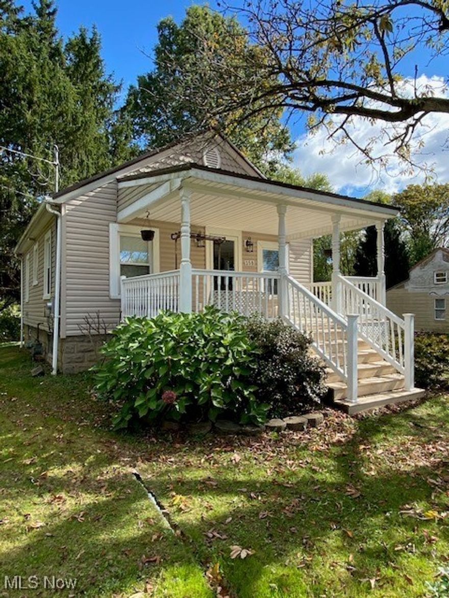 Welcome to this cute-as-a-button two-bedroom, one-bath home located in the Labrae School District with city water. City sewer connection is coming soon! Situated on nearly a half-acre lot this home offers a one-car garage featuring a covered patio, plus a covered front porch- perfect for relaxing evenings.  The side entrance features new steps and decking providing convenient and attractive access to the home. Inside, you'll love the updated eat-in kitchen with a breakfast bar overlooking the living room. Two cozy bedrooms (one featuring a stylish sliding barn door), and an updated full bath complete this cutie! The full waterproofed basement provides excellent storage or potential for additional living space. Notable updates include a new metal roof (2023), hot water tank (2017), furnace 3-5 years, & newer vinyl siding. The sellers are moving out of state-their loss is your gain!  They've poured love and care into this home with countless updates, ready for you to enjoy a happy, low maintenance lifestyle. Ask your agent about 100% financing-NO MONEY DOWN LOAN AVAILABLE.