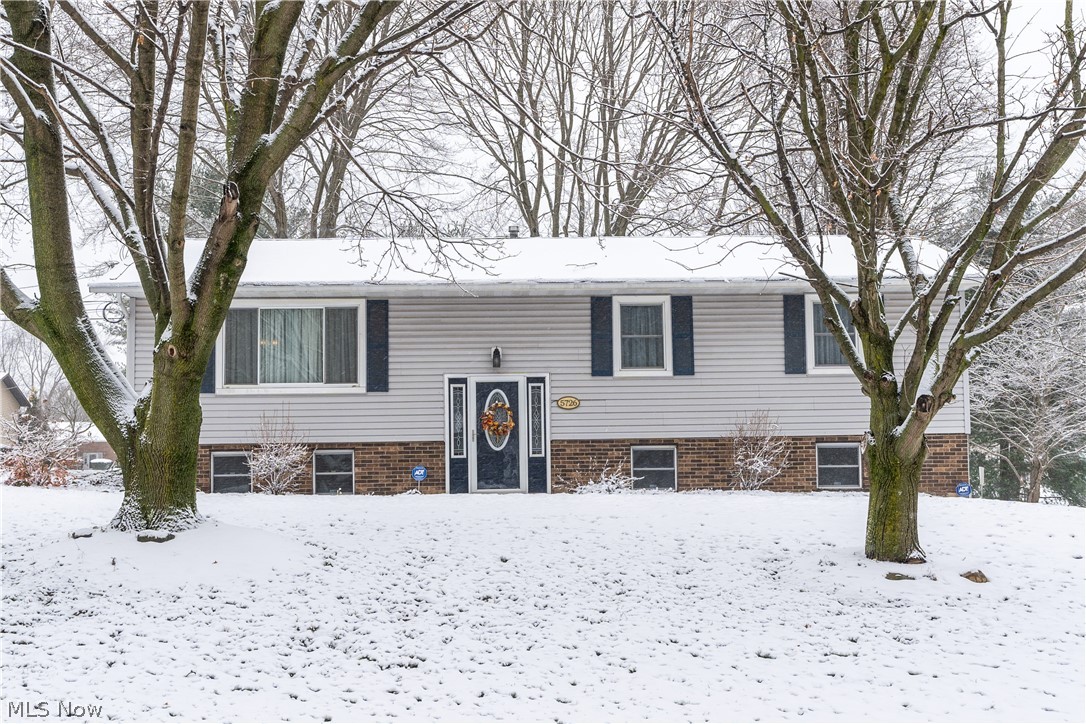Move in and enjoy this lovely three bedroom, vinyl sided bi-level in the Green School District. This home sits on a pretty corner lot, with a large rear yard for kids and family fun. Main level of this home boasts living and dining rooms (access from dining room to rear, carpeted sunroom and composite deck). Eat-in kitchen with vinyl flooring, oak cabinets, and stainless appliances. Three bedrooms and full bath just down the hall. Lower level features family/recreation room, half bath, and good sized area for laundry and storage, in addition to access to double attached garage with workbench. Large shed in back yard to hold all of your yard tools, etc. Special features of this home include replacement windows (unsure of age), glass block windows, invisible dog fence, water softener, and new roof on house (3/16/20) and sunporch (4/20/15). Just minutes from the expressway, shopping, schools, parks, and recreation/fitness facilities.