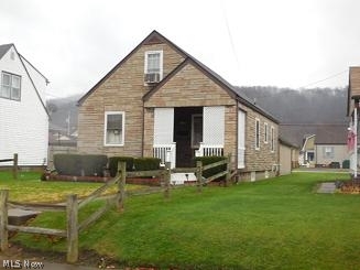 1 1/2 STORY, 4 BEDROOM HOME. BASEMENT FINISHED INTO A REC ROOM AND ADDITIONAL BR. STONE EXTERIOR. LEVEL LOT. HANDICAPPED STALL SHOWER IN BATHROOM. PRICED TO SELL. ELDERLY SELLER, NO RES. DISCLO. FORMS.